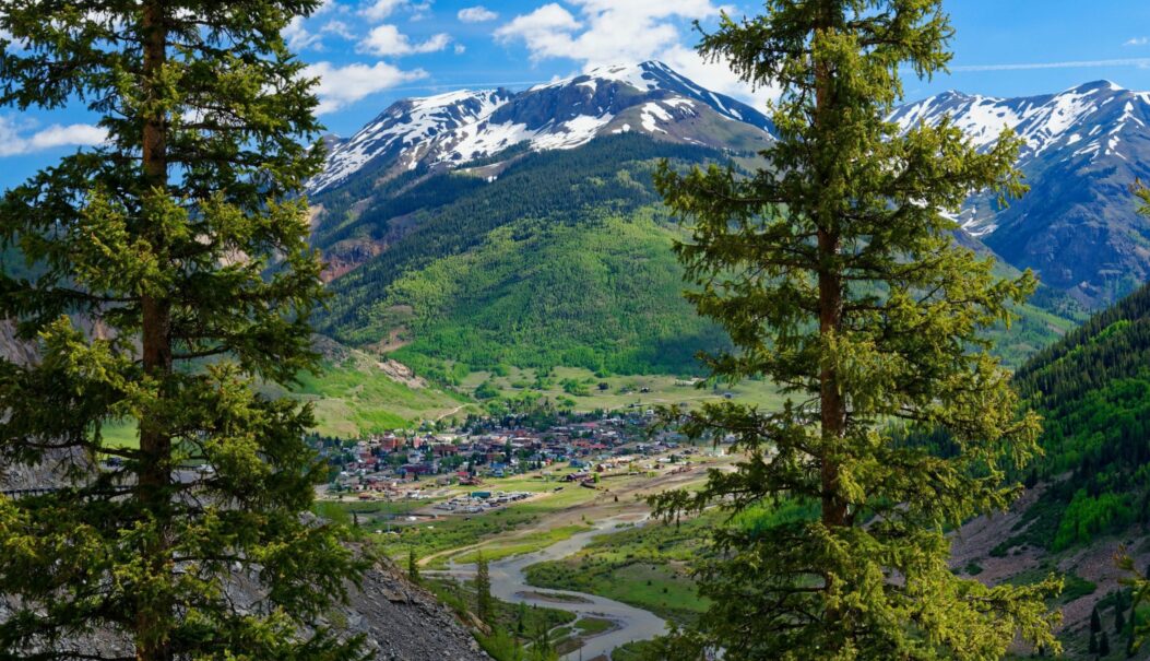 The town of Silverton, CO nestled in the valley during summertime.
